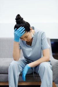Dentist examining patient who may need a dental bridge