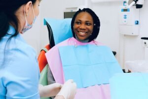 Dentist explaining tooth replacement options in Richmond Hill